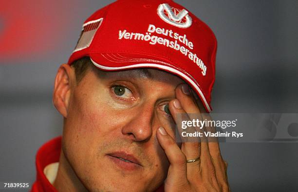 Michael Schumacher of Germany and Ferrari announces his retirement at the end of the season during a press conference after winning the Italian...