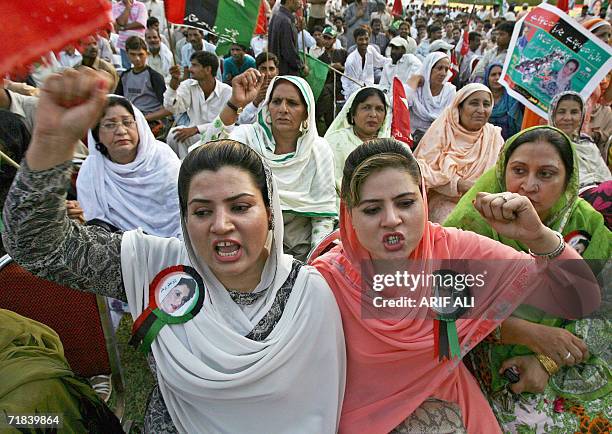 Activists of the Alliance for Restoration of Democracy shout anti-government slogans during a rally in Lahore, 10 September 2006. The ARD, along with...