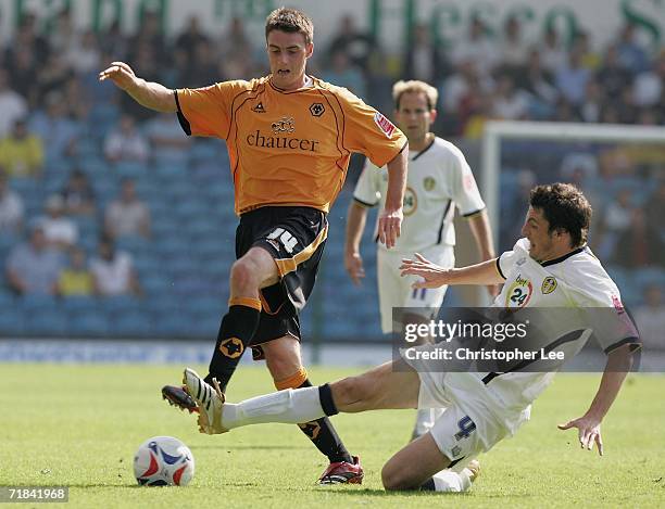 Darren Potter of Wolves is tackle by Jonathan Douglas of Leeds during the Coca-Cola Championship match between Leeds United and Wolverhampton...