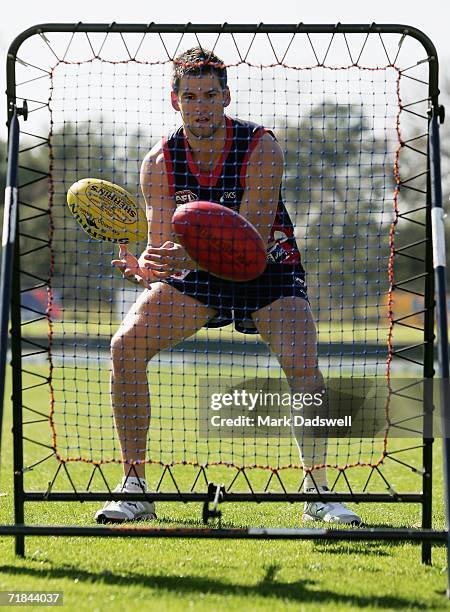 Jared Rivers of the Demons practices his ball skills during the Melbourne Football Clubs training session at the Junction Oval on September 11, 2006...