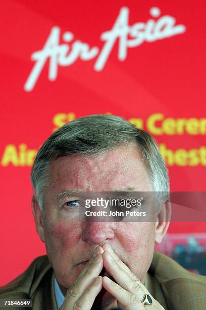 Sir Alex Ferguson of Manchester United speaks at a press conference to announce the extension of their partnership with AirAsia and to announce...