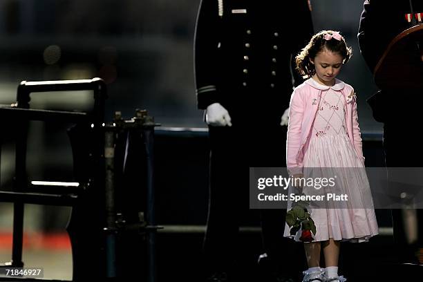 Patricia Smith, the daughter of police officer Moira Smith, killed on 9-11, stands on stage during the reading of names of victims of 9-11 during...