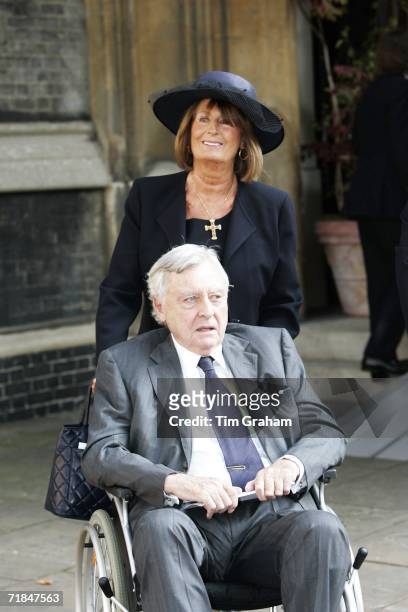 Lady Annabel Goldsmith helps her ex-husband Mark Birley out of St Paul's Church in Knightsbridge after a memorial service for Major Bruce Shand on...