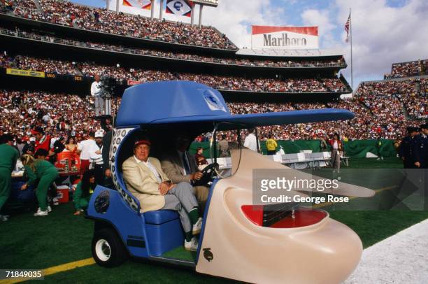 Entertainer Bob Hope sits in the "Hopemobile" during the 1988 San Diego, California, Superbowl XXII Half-time Show.
