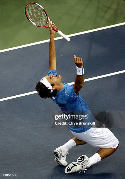 Roger Federer of Switzerland celebrates winning match point over Andy Roddick during the men's final U.S. Open at the USTA Billie Jean King National...