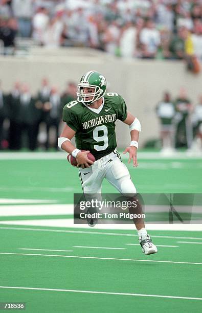 Jeff Smoker of the Michigan State Spartans moves with the ball during the game against the Notre Dame Fighting Irish at the Spartan Stadium in East...