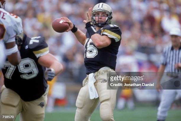 Quarterback Drew Brees of the Purdue Boilermakers looks to pass the ball during the game against the Minnesota Golden Gophers at the Ross-Ade Stadium...