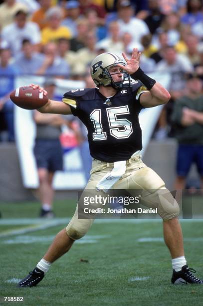Quarterback Drew Brees of the Purdue Boilermakers passes the ball during the game against the Minnesota Golden Gophers at the Ross-Ade Stadium in...
