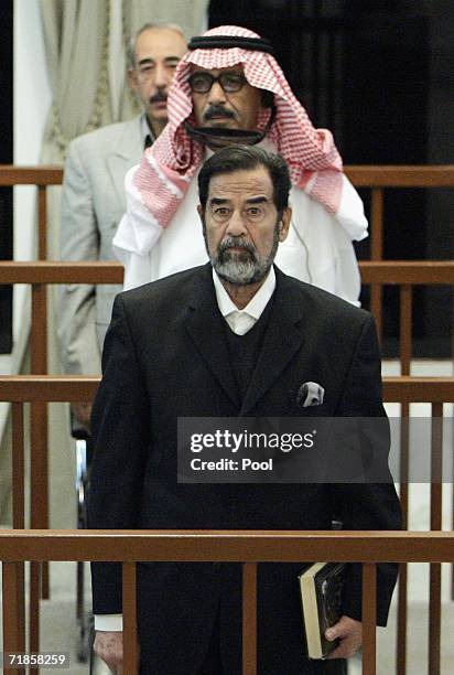 Saddam Hussein Trial Resumes Photos And Premium High Res Pictures saddam-hussein-trial-resumes-photos-and-premium-high-res-pictures