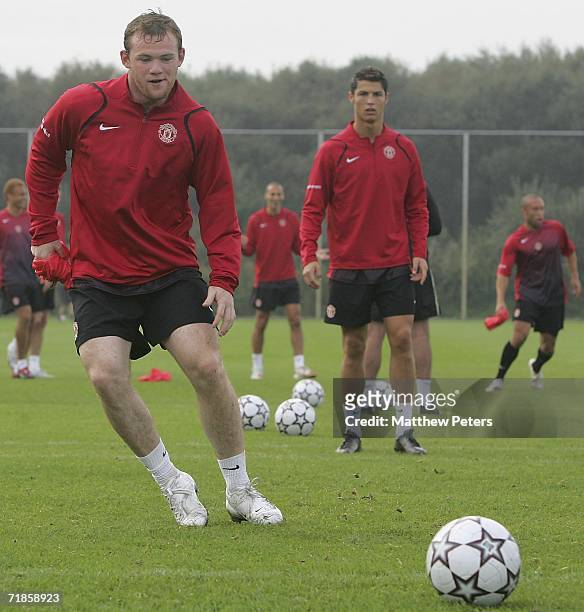 Wayne Rooney of Manchester United in action on the ball during a first team training session at Carrington Training Ground on September 12 2006 in...