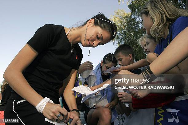 Miss Romania Ioana Valentina Boitor gives autographs to the audience after Miss Sport competition in Mazurian lakes region city of Gizycko, 12...