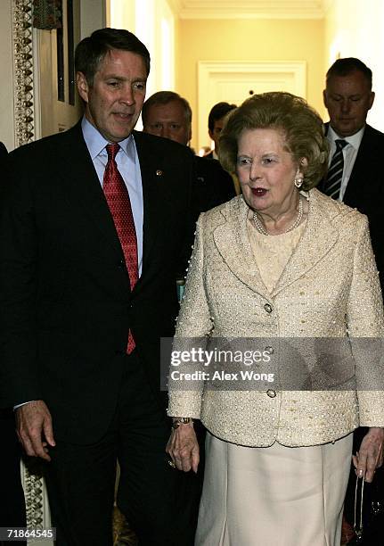 Former British Prime Minister Margaret Thatcher , escorted by U.S. Senate Majority Leader Sen. Bill Frist , leaves after meeting with Republican...