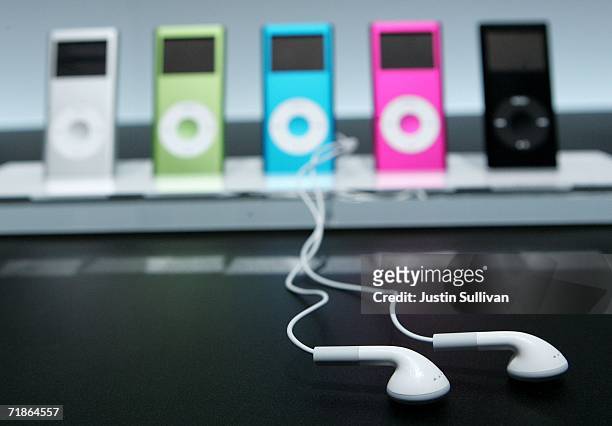 New iPod earphones are seen next to a display of the new iPod Nano at an Apple media event September 12, 2006 in San Francisco. Apple CEO Steve Jobs...