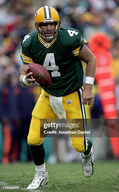 Brett Favre of the Green Bay Packers carries the ball during the game with the Chicago Bears on September 10, 2006 at Lambeau Field in Green Bay,...