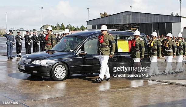 Royal escorts follow the hearse carrying the body of The Late Tongan King Taufa'ahau Tupou IV at Whenuapai Airbase, September 13, 2006 in Auckland,...