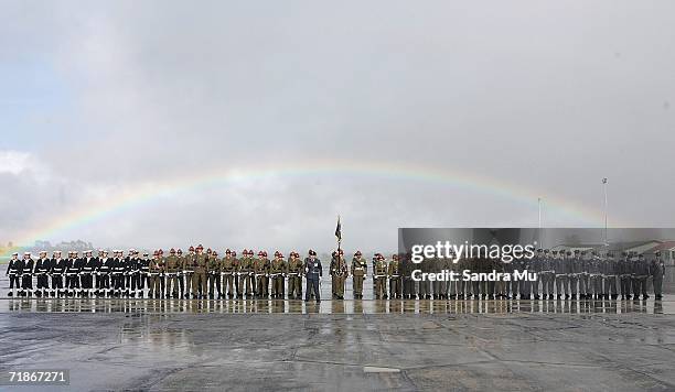 Members of the Navy, Air Force and Army line a guard of honour for the body of The Late Tongan King Taufa'ahau Tupou IV at Whenuapai Airbase...