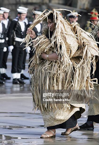 Princess Pilolevu walks past the guard of honour as she follows the hearse carrying her late father, Tongan King Taufa'ahau Tupou IV at Whenuapai...