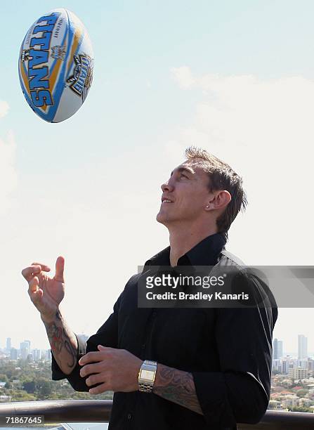 Mat Rogers throws a Titans ball into the air after a press conferance at Jupiters Casino on September 13, 2006 on the Gold Coast, Australia. Rogers...
