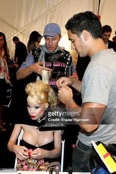Amanda Lepore gets ready backstage at the Heatherette Spring 2007 fashion show during Olympus Fashion Week at the Tent in Bryant Park September 12,...