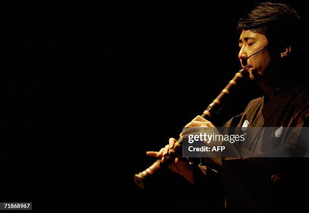 The Japanese musician Hiromu Motonaga plays a traditional Japanese musical instrument "Shakuhachi" during the "Sounds of Traditional Japan - Today"...