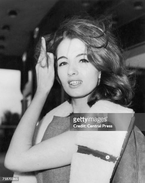 Christine Keeler leaving the Ariel Hotel, London, after her return from Spain, 29th March 1963. Two weeks previously, she had failed to give evidence...