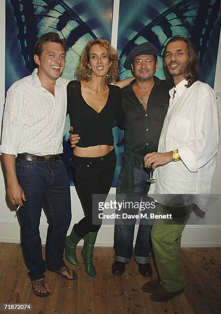 Nolan Hemmings, Sarah Woodhead, Adam Bricusse and Rory Keegan attend the Adam Bricusse's 'Mysteries Within' exhibition on September 13 in London,...