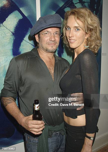 Sarah Woodhead and Adam Bricusse attend the Adam Bricusse's 'Mysteries Within' exhibition on September 13 in London, England.