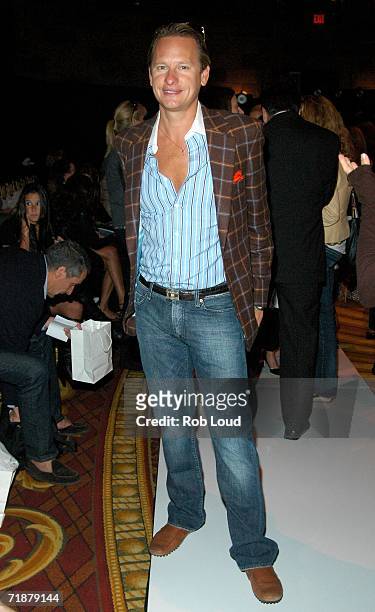 Television personality Carson Kressley poses in the front row at the Douglas Hannant Spring 2007 fashion show during Olympus Fashion Week at Gotham...