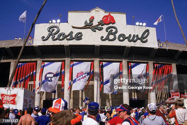 Exterior front entrance view of the Rose Bowl as fans enter the stadium for Super Bowl XXI between the New York Giants and the Denver Broncos at the...