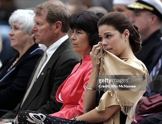 Maria Paz Leveque , wife of Navy Seal Danny Dietz, wipes away a tear during a ceremony posthumously awarding Dietz the Navy Cross September 13, 2006...