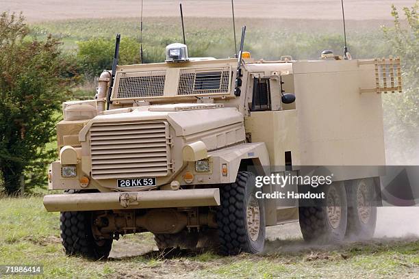 In this handout image supplied by the Ministry Of Defence, A new Cougar/Mastif vehicle is displayed at the presentation of new protection vehicles to...