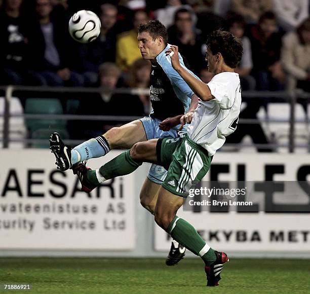 James Milner of Newcaste United is tackled by Andrei Kalimullin of FC Levadia during the UEFA Cup first round, first leg match bewteen FC Levadia and...