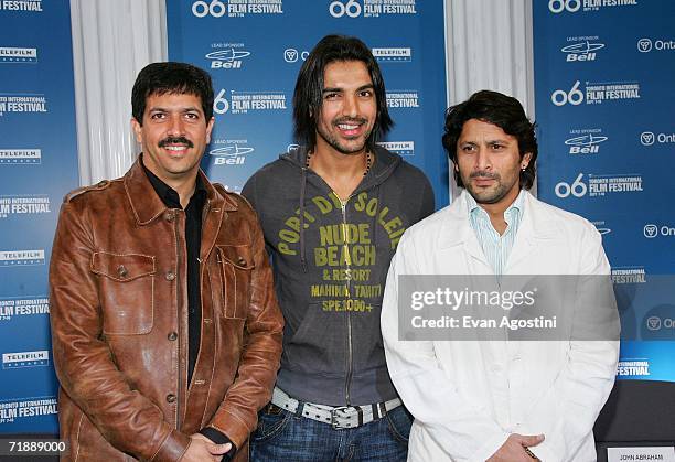 Writer/director Kabir Khan, actor John Abraham and Mohit Rajhans attend the "Kabul Express" press conference during the Toronto International Film...