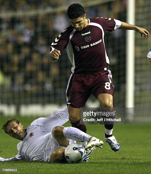 Hearts Bruno Aguiar is tackled by Daniel Kolar of Sparta Prague during the UEFA Cup first round, first leg match between Hearts and Sparta Prague at...