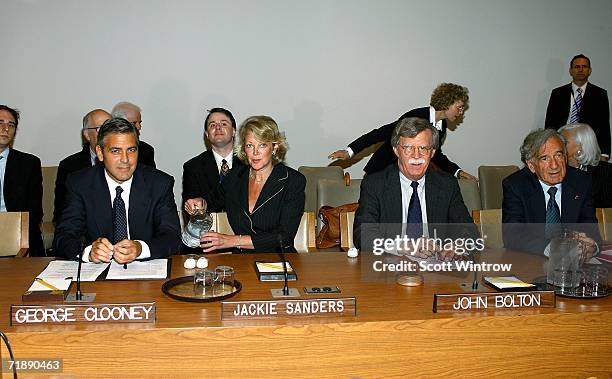 Actor George Clooney, Deputy Ambassador Jackie Sanders, Ambassador to the United Nations John Bolton and Elie Wiesel address the United Nations...