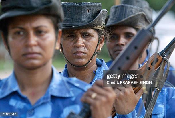 Indian policewomen of the Central Reserve Police Force practice their riot control skills during training at a camp of the CRPF's elite Rapid Action...