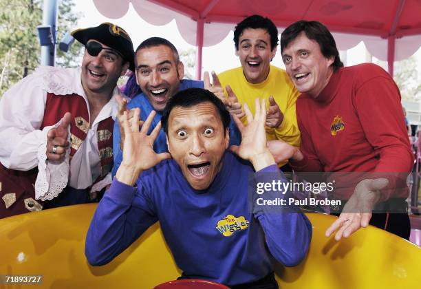 The Wiggles pose on Dreamworld's latest attraction "Dorothy's Rosy Tea Cup" as they celebrate their 15th birthday at Wiggles World on September 15,...