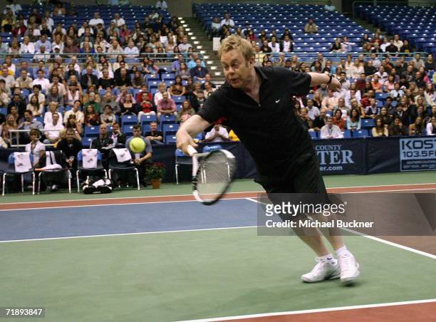 Sir Elton John patriciaptes in the Advanta WTT Smash Hits celebrity tennis match to benefit the Elton John AIDS Foundation at the Bren Center at UC...