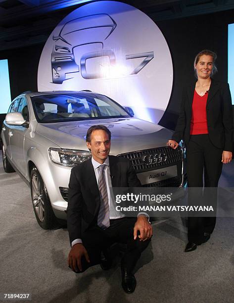 Executive Director, Overseas Region, German carmaker Audi, Andre Konsbruck and Product Manager, Audi Q7, Sandra Berger pose with the newly-launched...