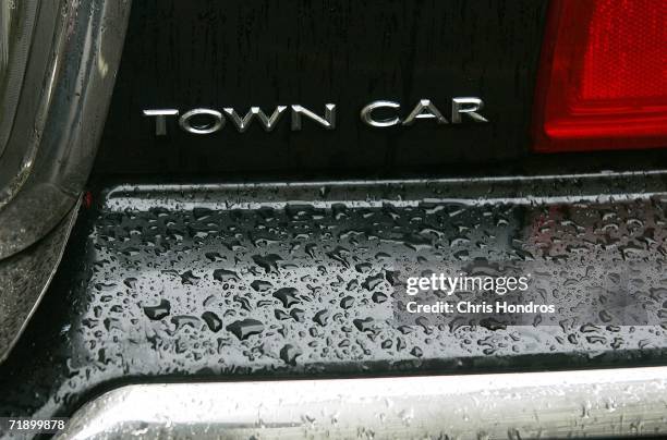 Lincoln Town Car logo hangs on a car September 15, 2006 in New York City. After speculation that Ford Motor Co would discontinue making the Lincoln...