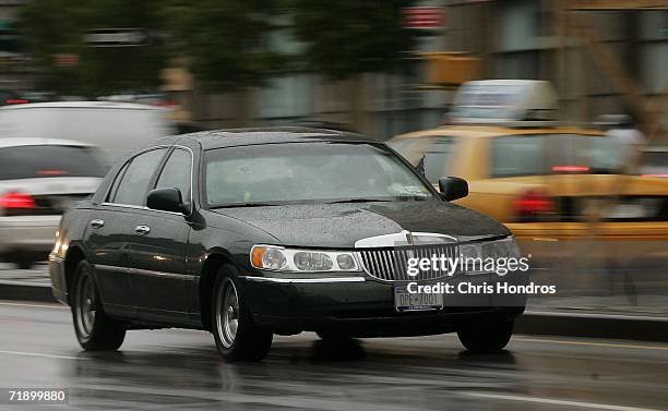 Lincoln Town Car works its way through traffic September 15, 2006 in New York City. After speculation that Ford Motor Co would discontinue making the...