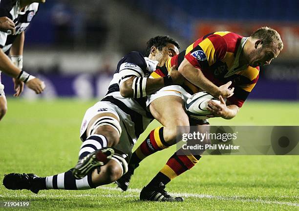 Tom Willis of Waikato is tackled by Andrew Blowers of Auckland during the Air New Zealand Cup match between Auckland and Waikato at Eden Park...