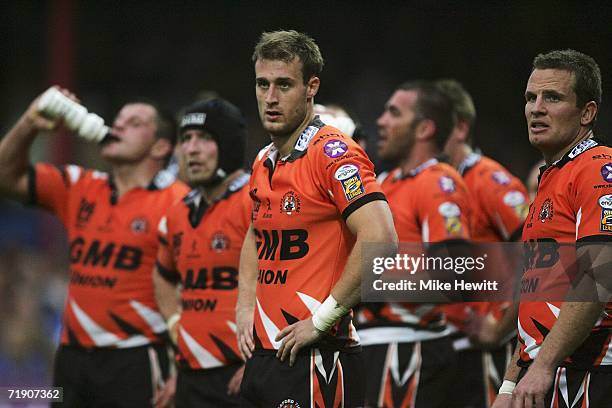 Dejected Castleford players look on, as their team head to defeat and relegation from the Superleague, during the Superleague match between Wakefield...