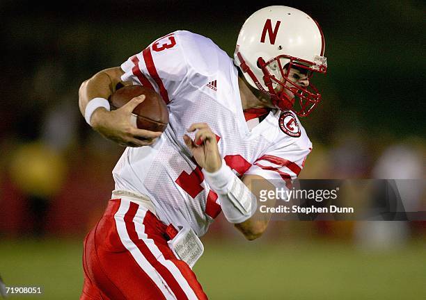 Quarterback Zac Taylor of the Nebraska Cornhuskers scrambles with the ball against the USC Trojans on September 16, 2006 at the Los Angeles Memorial...