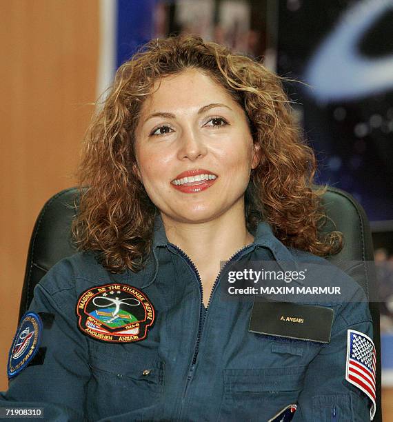 The world's first female space tourist Anoushen Ansari smiles during a press conference in Baikonur, 17 September 2006. The flight of the world's...