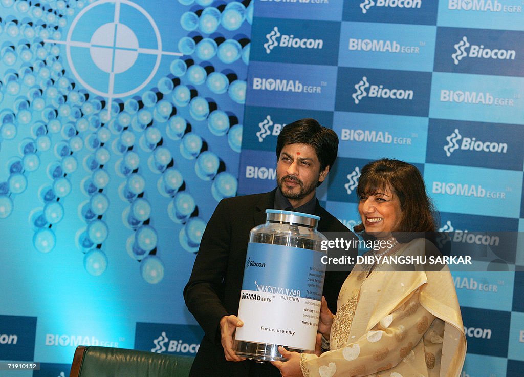Bollywood actor Shah Rukh Khan, (L), alo