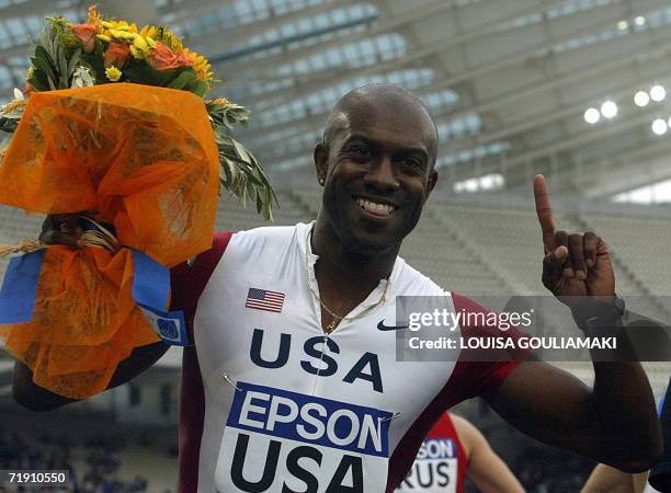 Allen Johnson of the USA celebrates after winning men 110m hurdles during the Athletics World Cup Athens 2006, at the Olympic Stadium in Athens 17...