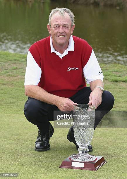 Carl Mason of England poses with the trophy after the final round of the Midas Group English Seniors Open played over the St Mellion International...