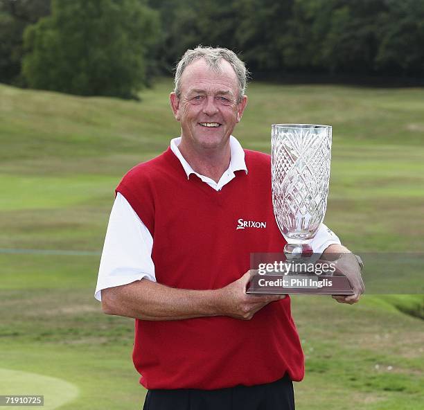 Carl Mason of England poses with the trophy after the final round of the Midas Group English Seniors Open played over the St Mellion International...