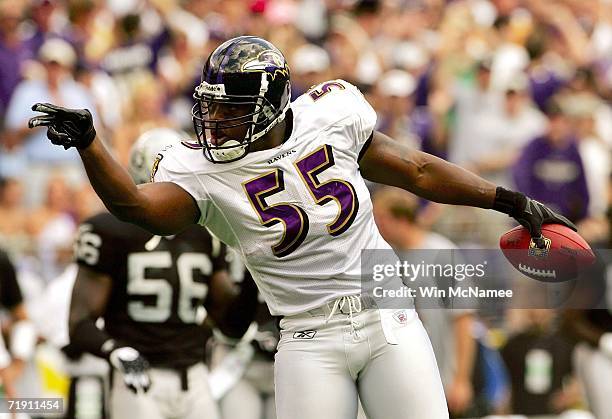 Linebacker Terrell Suggs of the Baltimore Ravens gestures to the crowd after recovering a fumble in first quarter against the Oakland Raiders on...